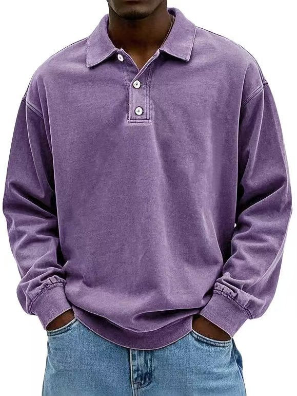 Person wearing a purple long-sleeve polo shirt with a white background