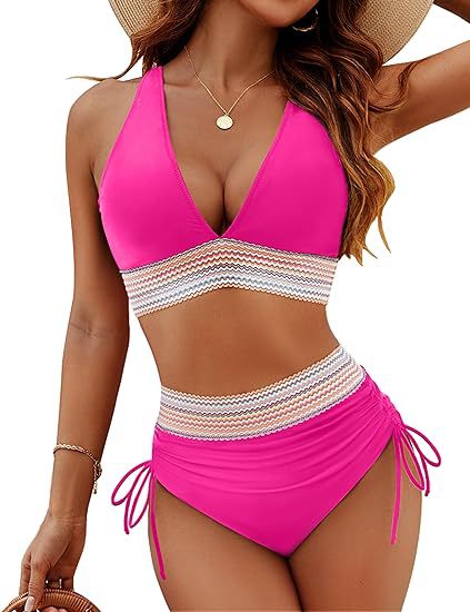 Woman wearing a pink bikini with a white zigzag pattern on a white background