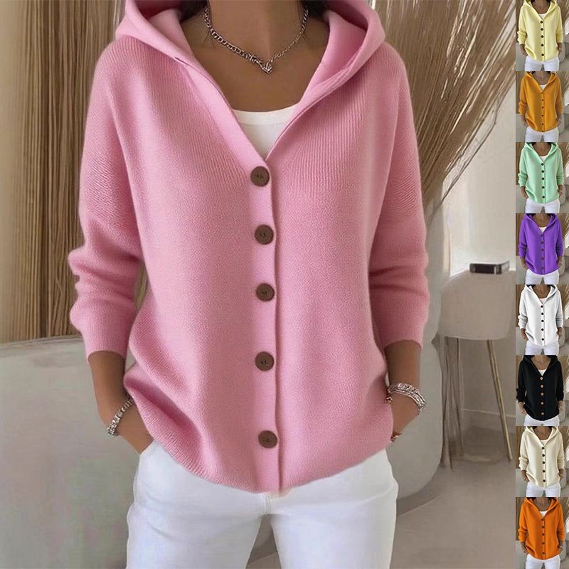 Pink cardigan with brown buttons worn by a person, with color swatches on the right.