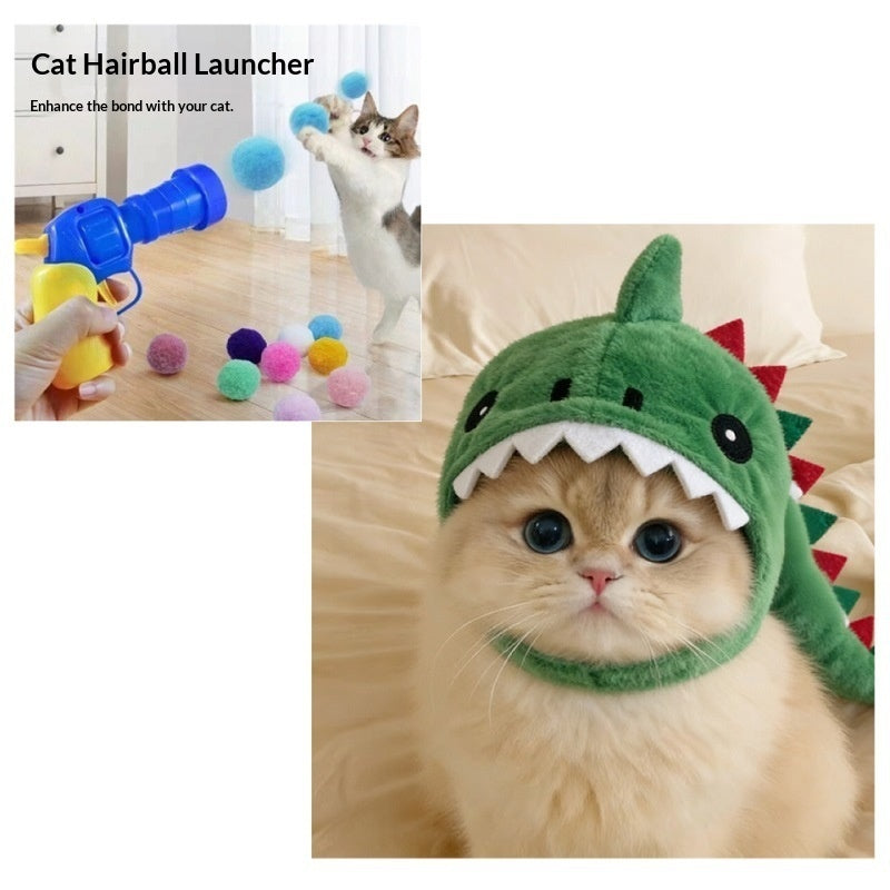 A collage showing a cat hair ball launcher toy and a fluffy cat wearing a green dinosaur-shaped hood. The left inset shows a hand holding the blue and yellow launcher with colorful pom-poms scattered on a floor, and the right main photo shows the cat in a bedroom setting wearing the green dinosaur hood with white teeth details.