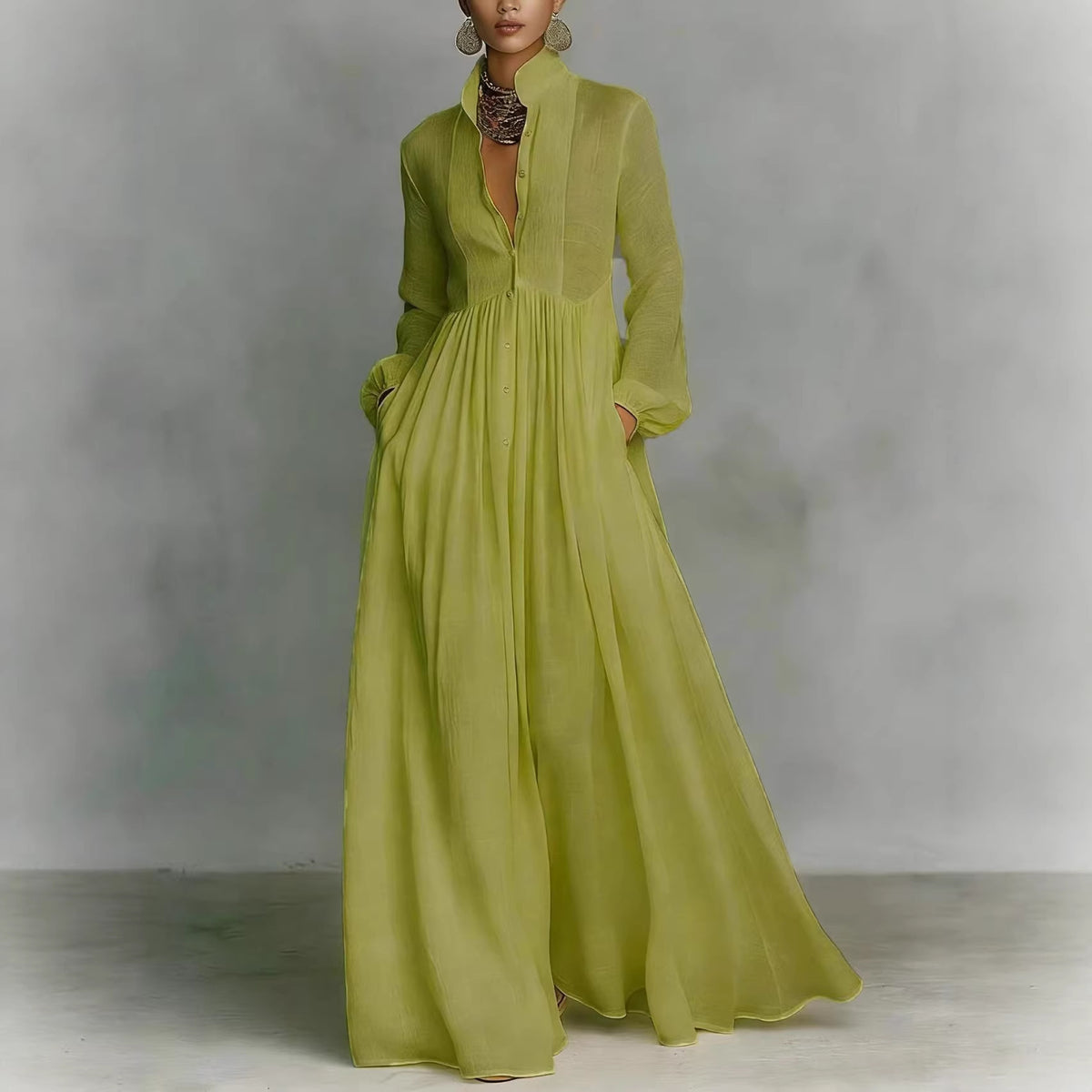 Green long dress on a plain background