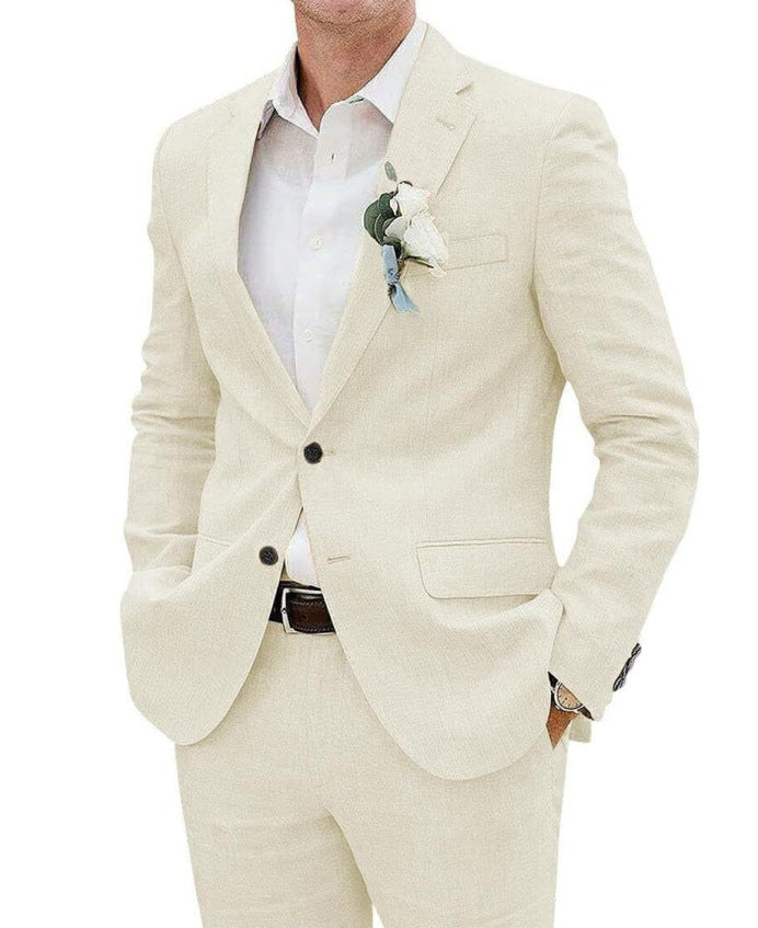 Man wearing a beige suit with a white shirt and a boutonniere on a white background