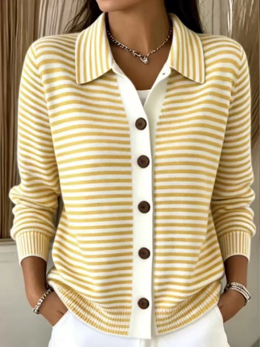 A woman wearing a yellow and white striped knit cardigan with a white collar and brown buttons, layered over a white top.