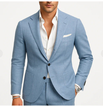 Light blue suit jacket with white shirt on a plain background