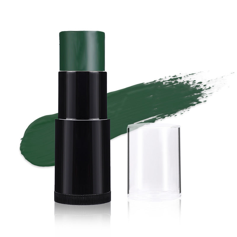 Green makeup stick with a swatch on a white background