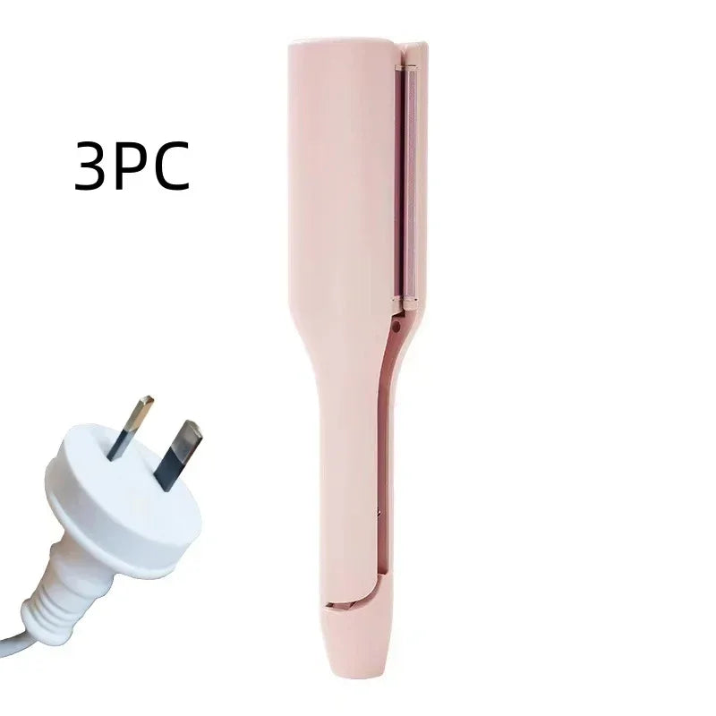 Pink electric hair styling tool with UK plug and 3PC label on white background