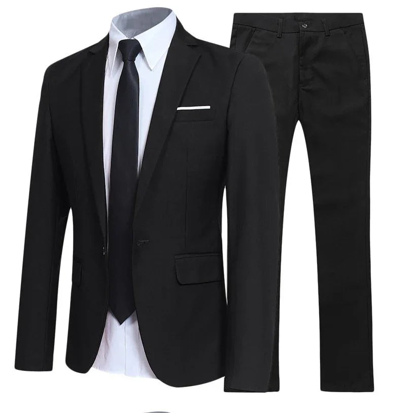 Black suit jacket, white shirt, and black pants on a white background