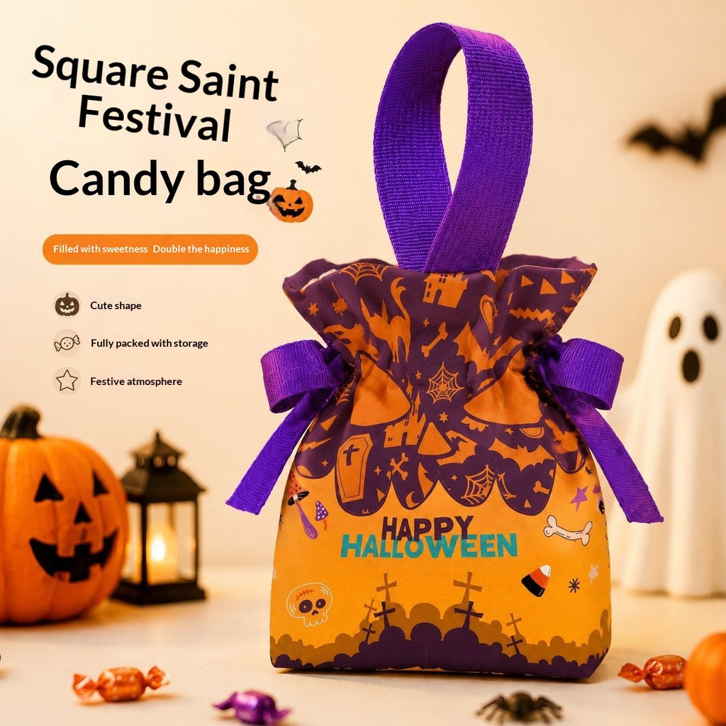 Square Halloween candy bag with a purple ribbon handle and bow, decorated with orange and purple spooky graphics and the words 'Happy Halloween.' The bag is shown on a tabletop with pumpkins, candy, a ghost, and Halloween-themed text in the background.