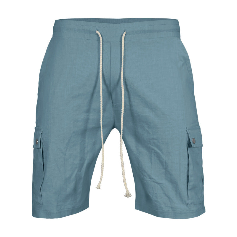 Blue shorts with a drawstring on a white background