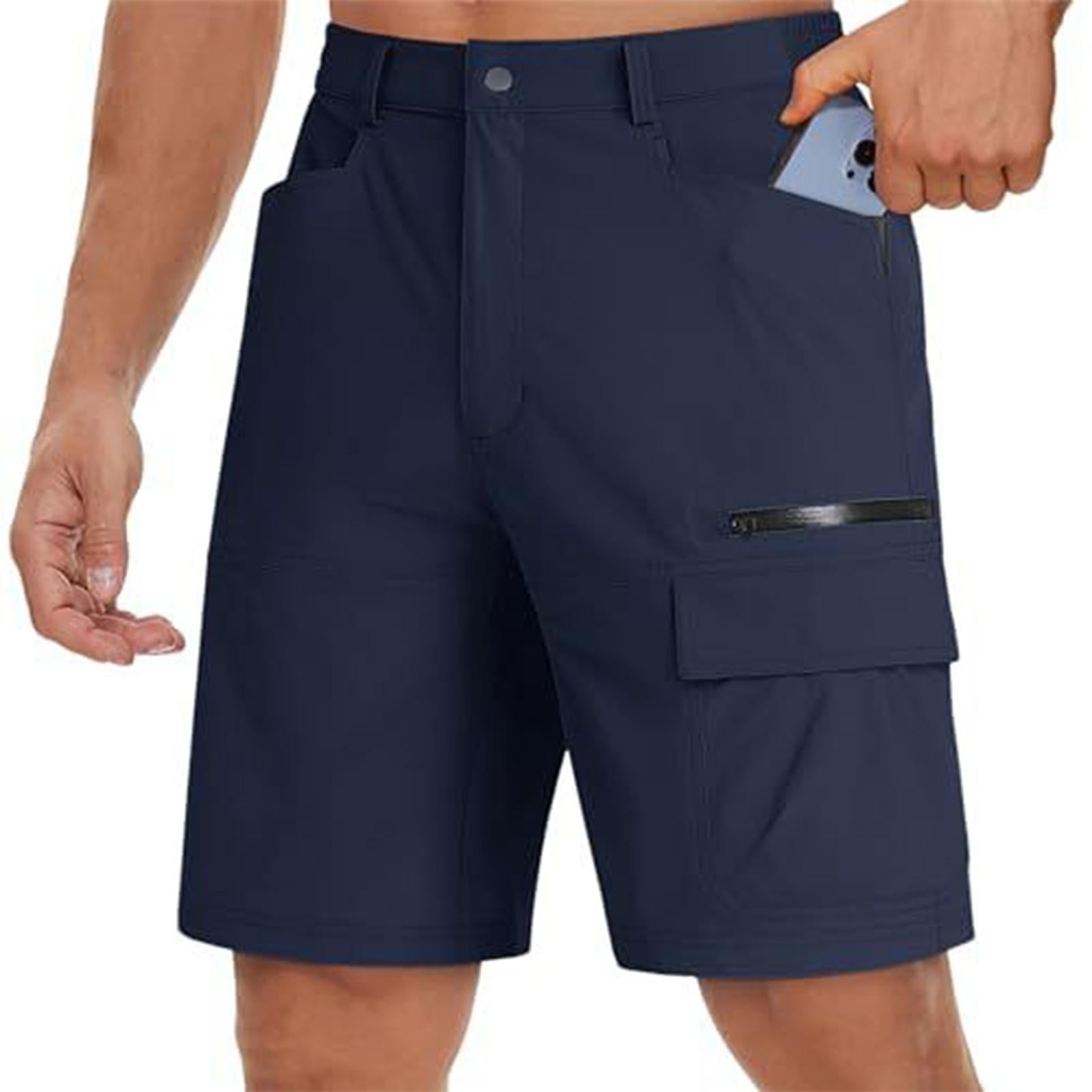 Navy blue cargo shorts worn by a person on a white background