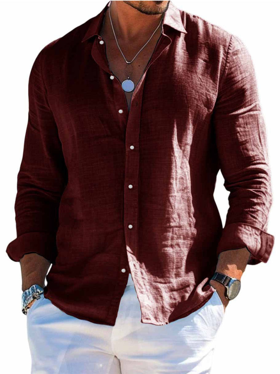 Man wearing a brown button-up shirt with a blurred background