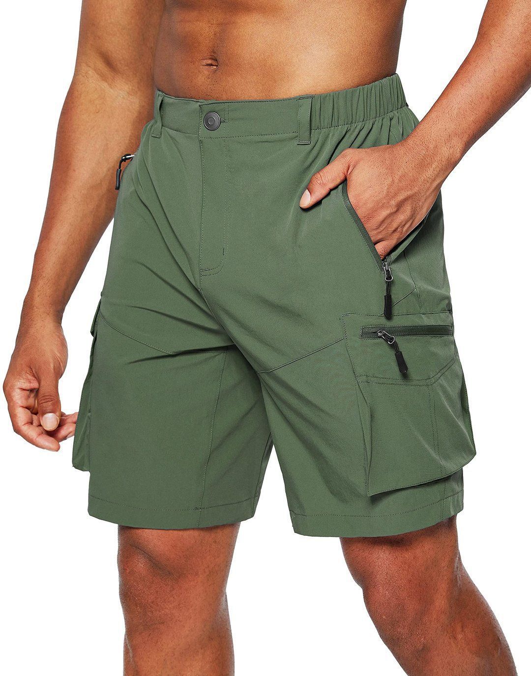 Green cargo shorts worn by a person on a white background
