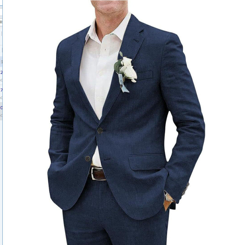 Navy blue suit with a white shirt and floral boutonniere on a white background