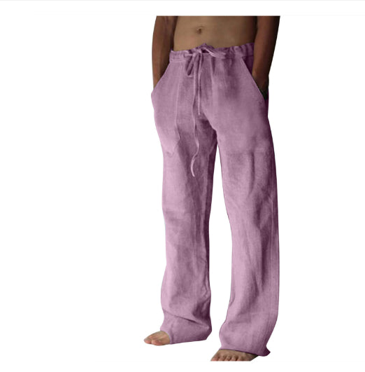 Purple linen pants worn by a person on a white background