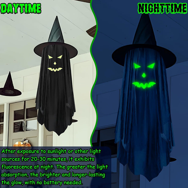 Halloween decoration shown in a split daylight and nighttime demonstration. The product is a black witch hat with a black ghost-like drape and a glowing jack-o'-lantern face.