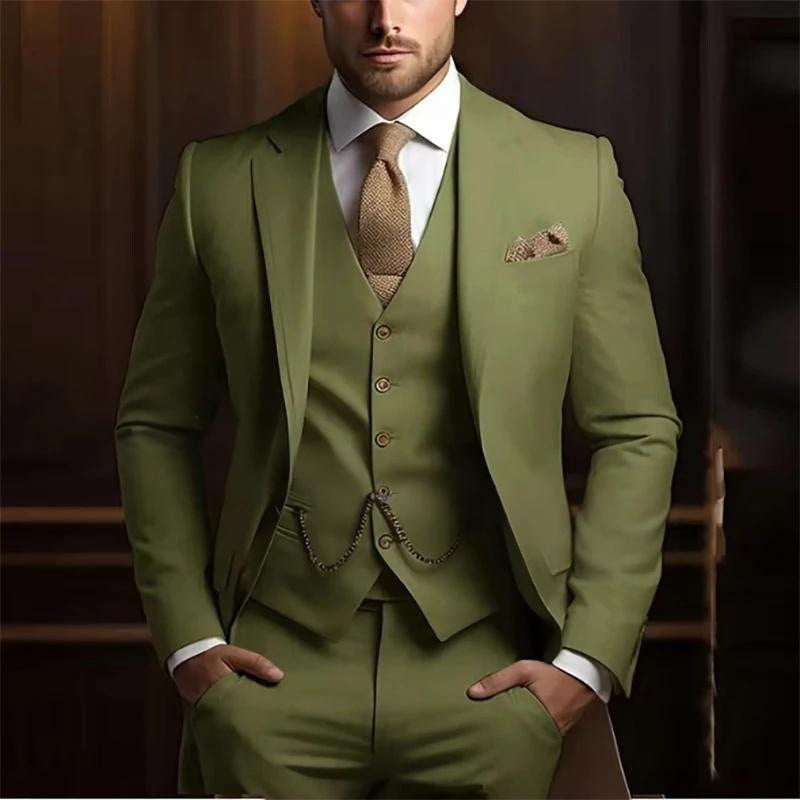 Green suit with a white shirt and brown tie against a blurred background