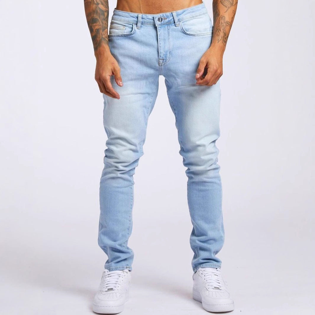 Light blue jeans worn by a person on a white background