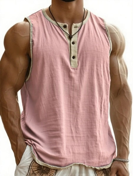 Man wearing a pink sleeveless shirt with buttons on a white background