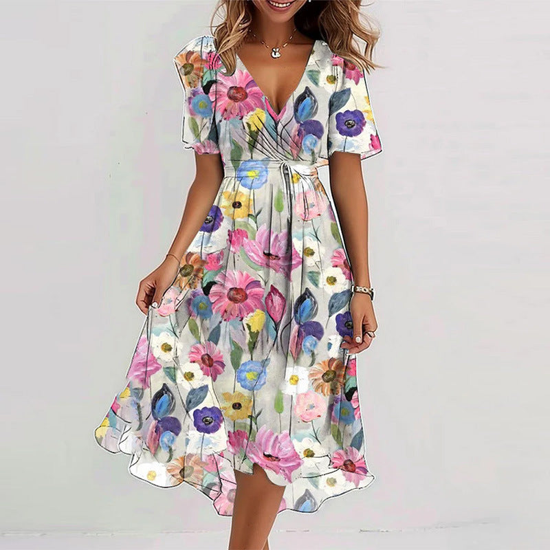 Woman wearing a colorful floral dress on a white background