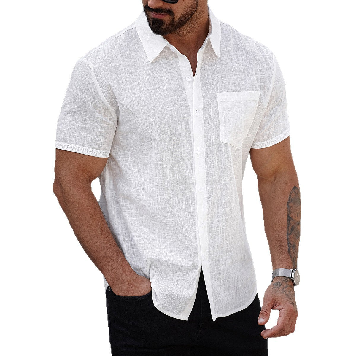 Man wearing a white short-sleeve linen shirt on a white background
