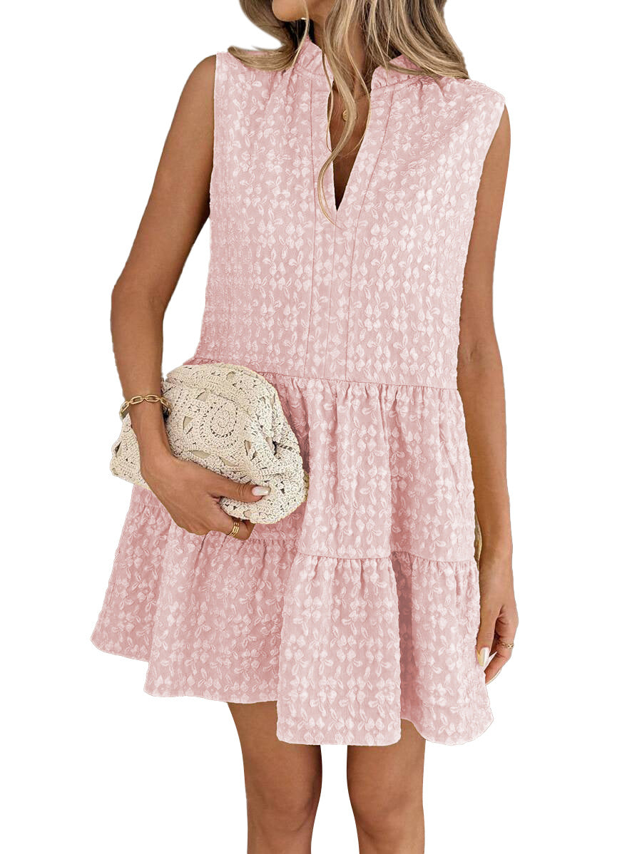 Woman wearing a pink dress with a white background
