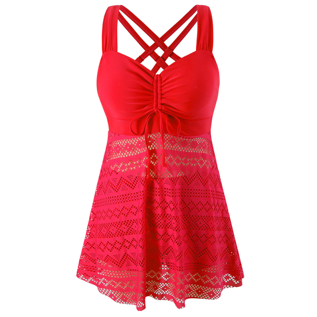 Red lace dress with criss-cross straps on a white background