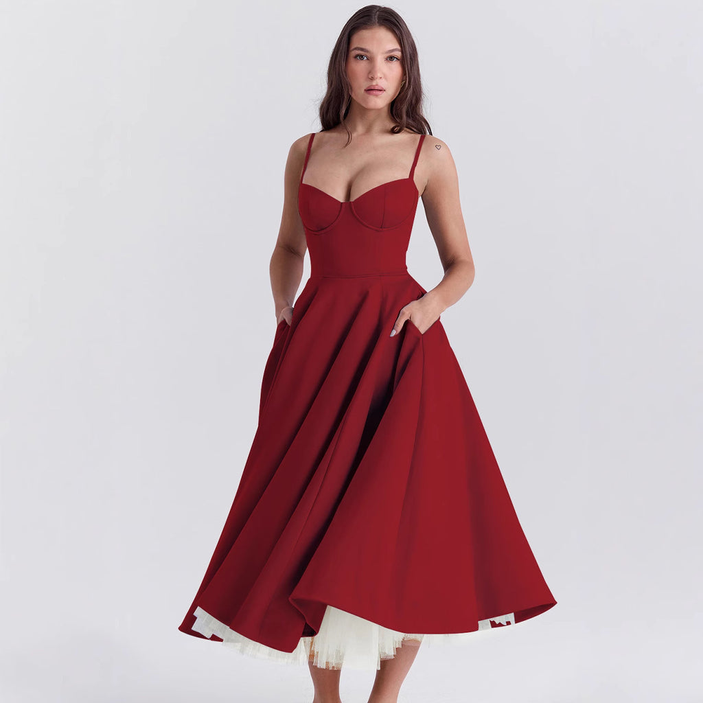 Red dress with a white hem on a plain background