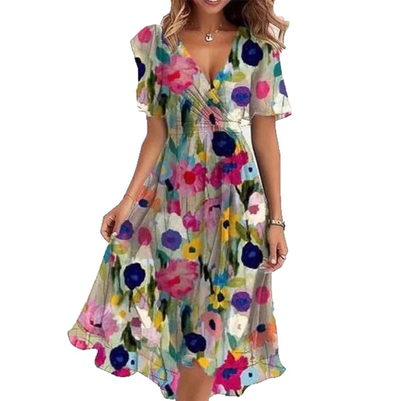 Woman wearing a colorful floral dress on a white background