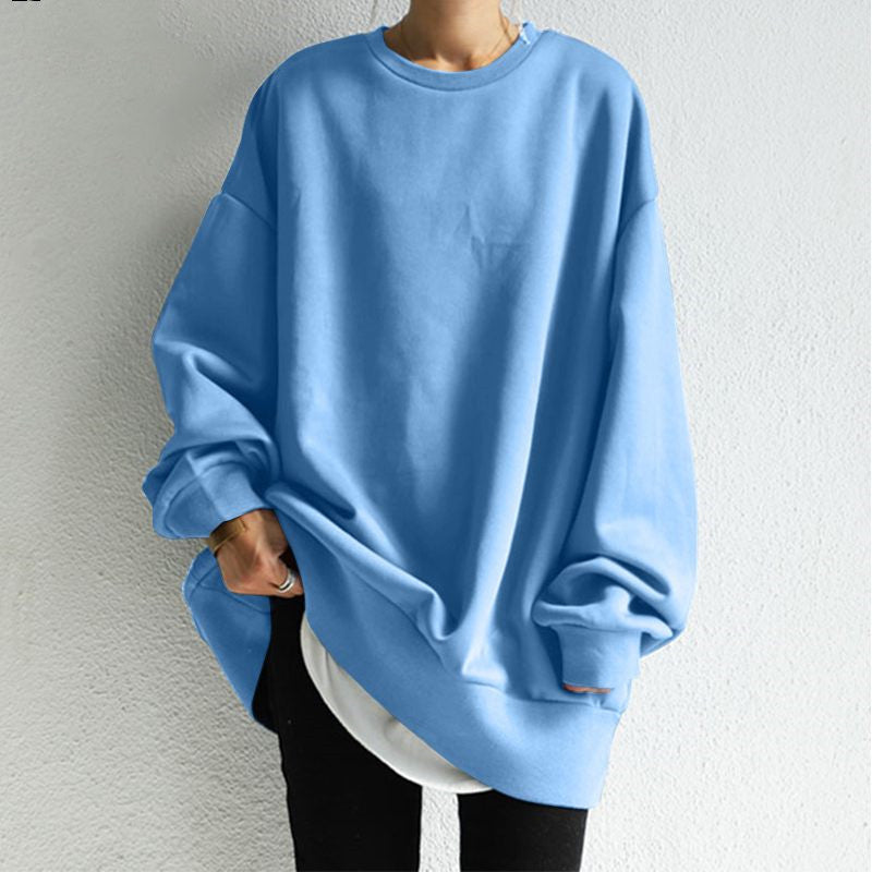 Light blue sweatshirt worn by a person against a plain background