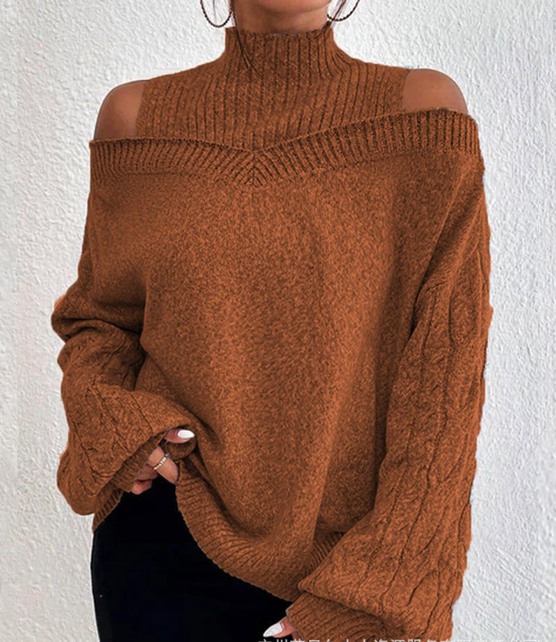 Brown off-shoulder sweater worn by a person against a white background