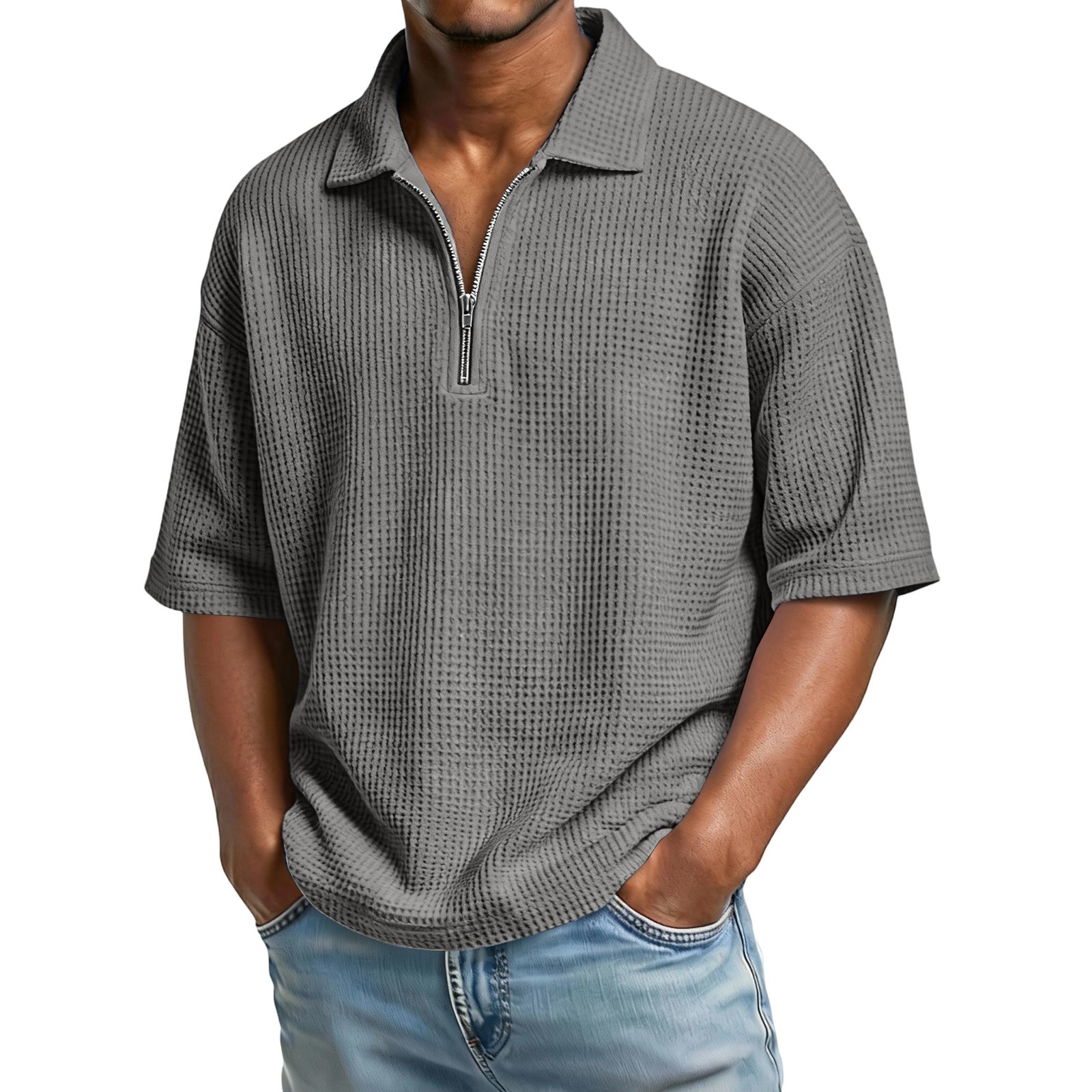 Man wearing a gray textured short-sleeve shirt with a zipper on a white background