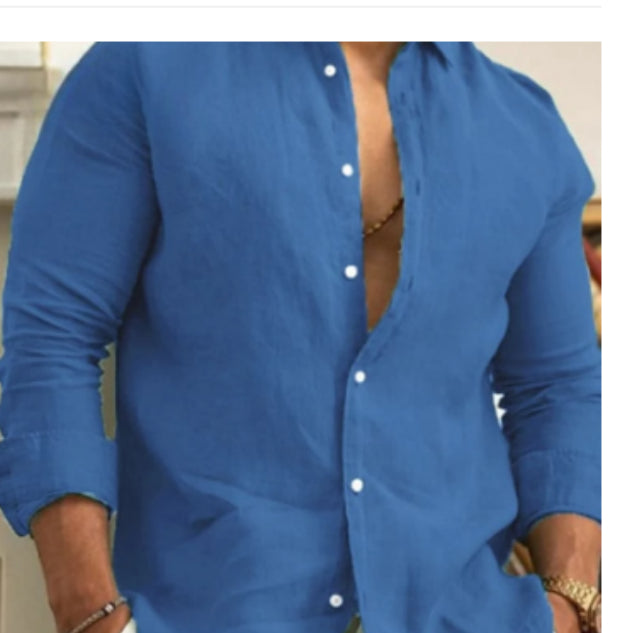 Blue button-up shirt worn by a person with a blurred background
