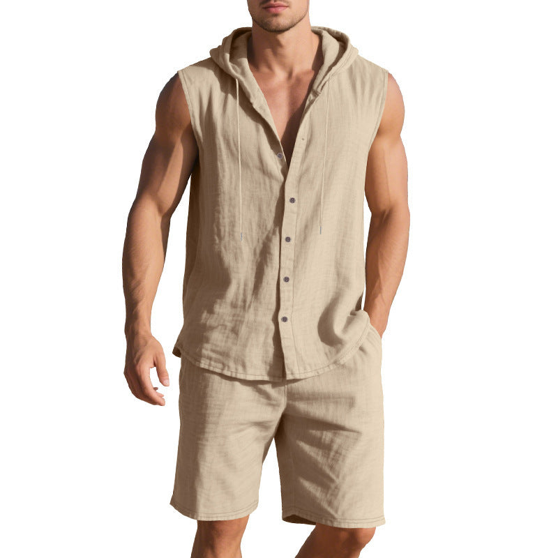 Man wearing a beige sleeveless shirt with a hood and shorts on a white background