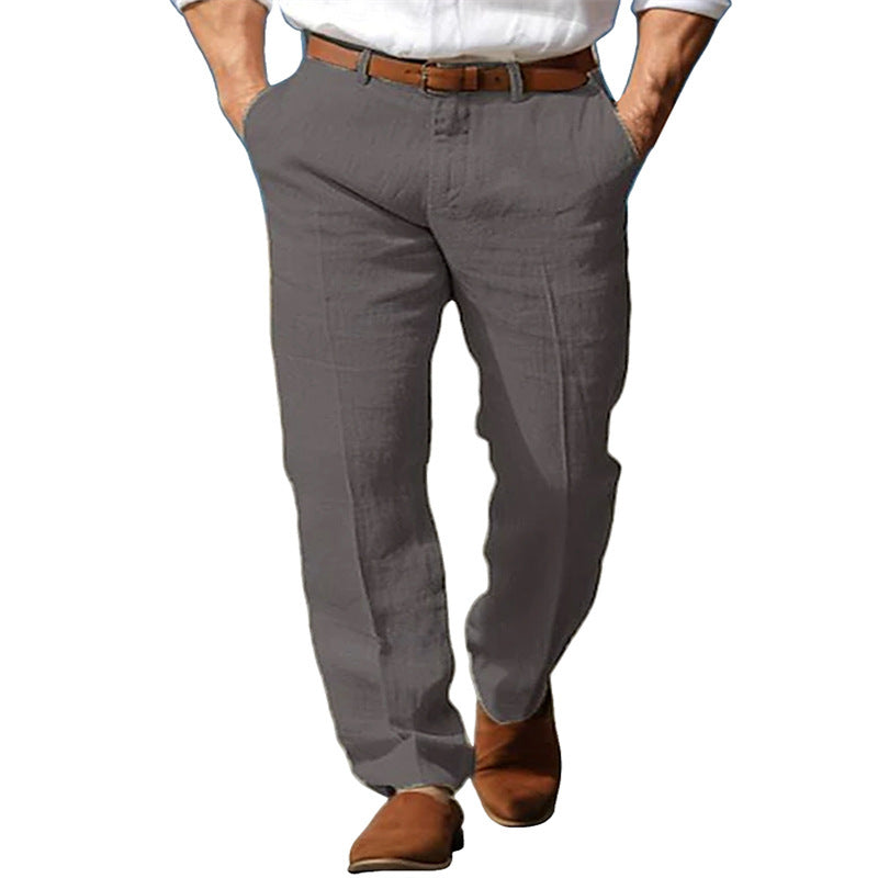 Gray pants worn by a person on a white background