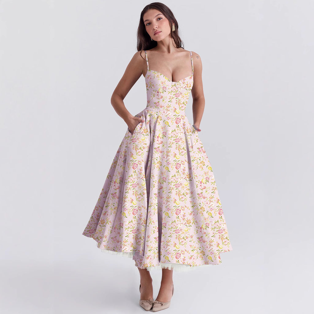 Woman wearing a floral dress on a light gray background