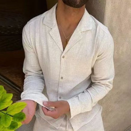 Man wearing a light-colored linen shirt with a neutral background