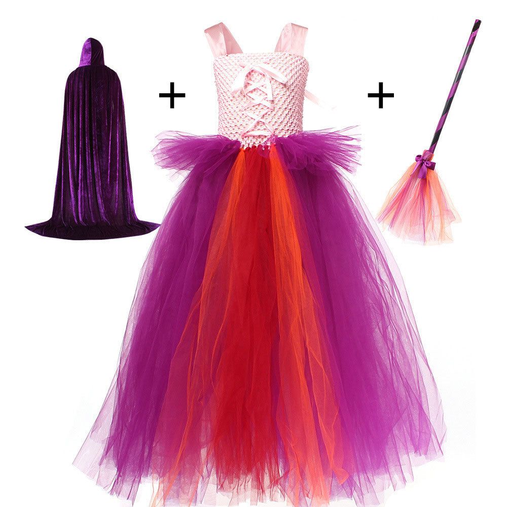 Colorful tutu dress with a black cape, pink wand, and broom on a white background