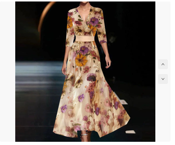 Model wearing a floral dress on a runway