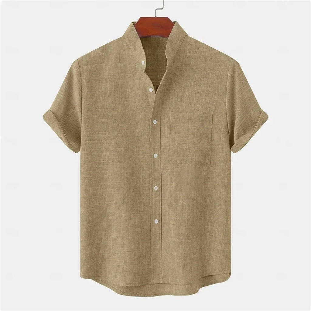 Beige short-sleeve shirt on a hanger against a white background