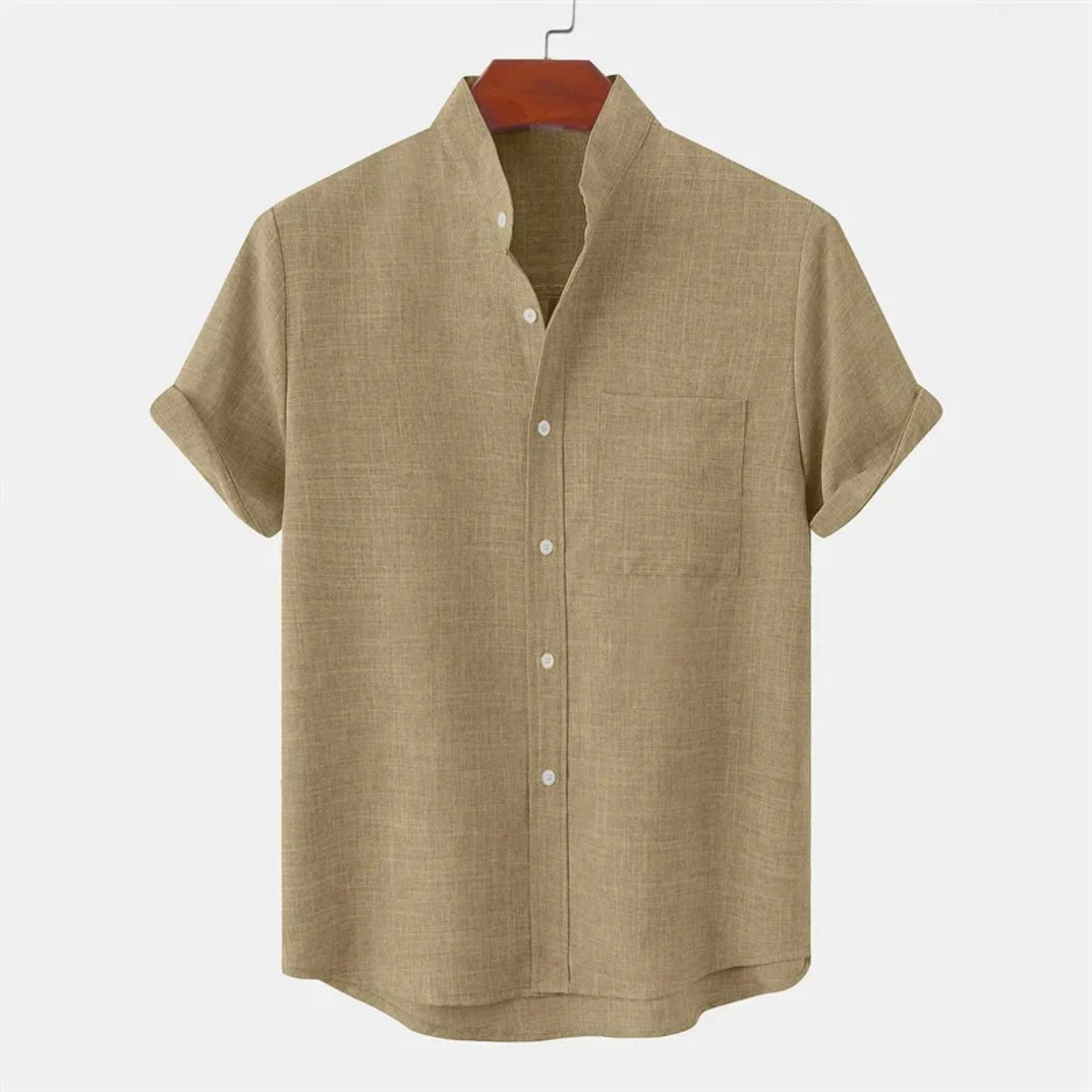 Beige short-sleeve shirt on a hanger against a white background
