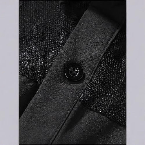 Close-up of a black button on a textured fabric background