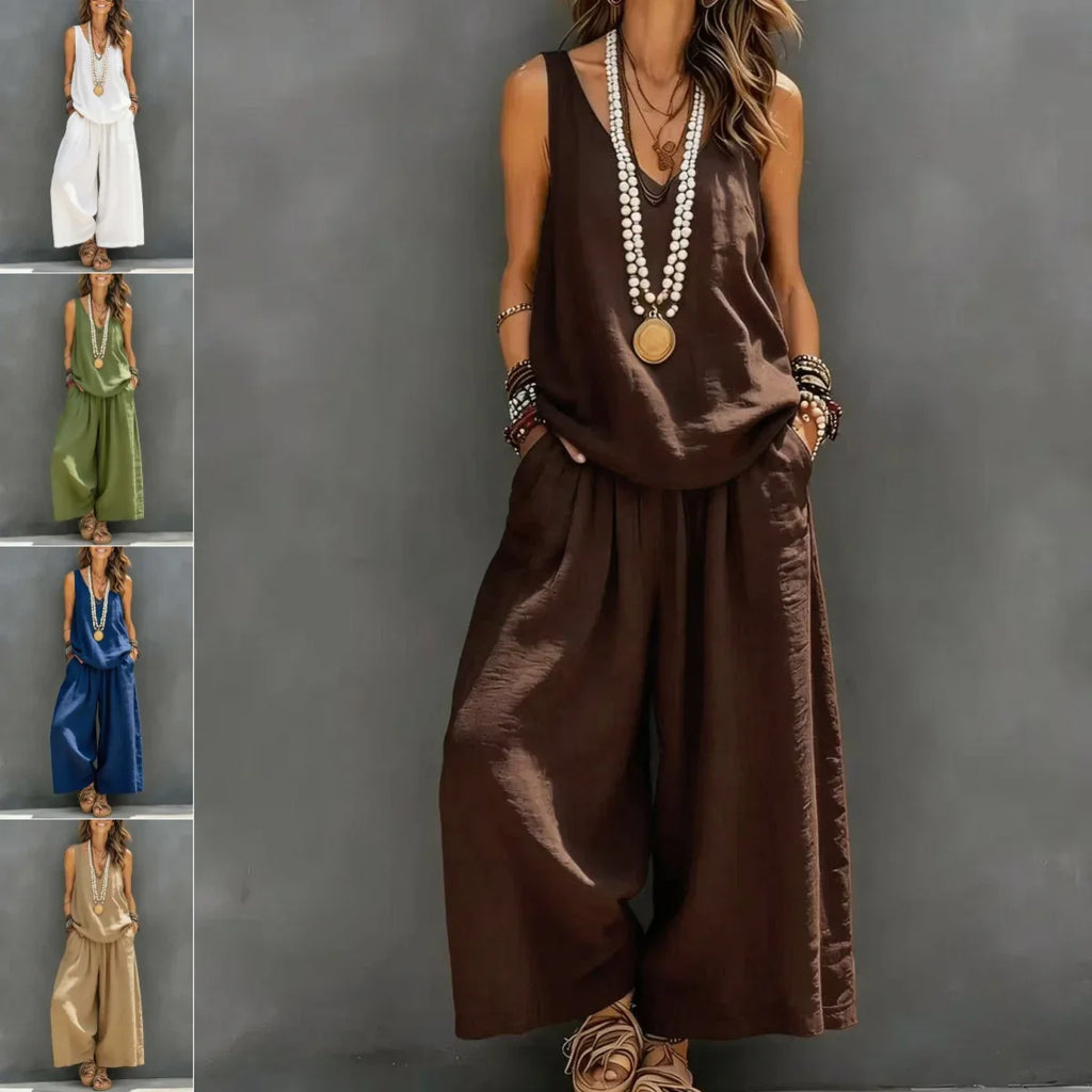 Woman wearing a brown jumpsuit with a gray background