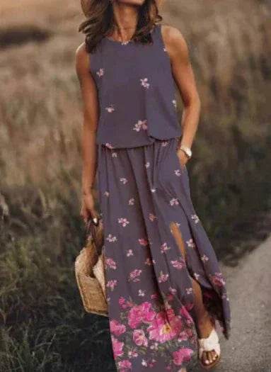 Woman in sleeveless purple floral maxi dress holding straw bag, ZA-Zola fashion style
