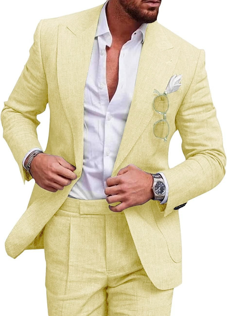 Man wearing a light yellow suit with a white shirt on a white background