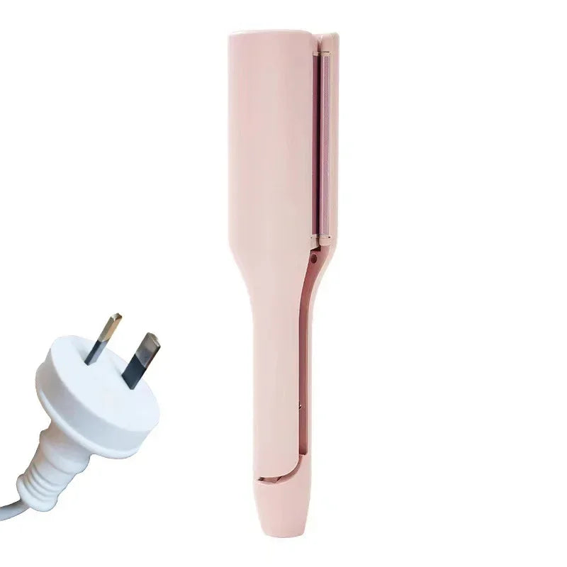 Pink electric hair curler with power plug for women’s beauty styling