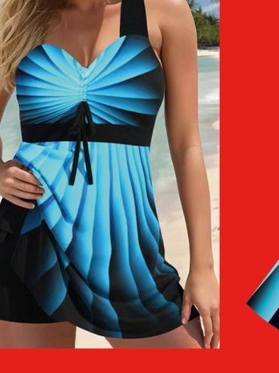 Woman wearing a blue and black dress with a blurred background