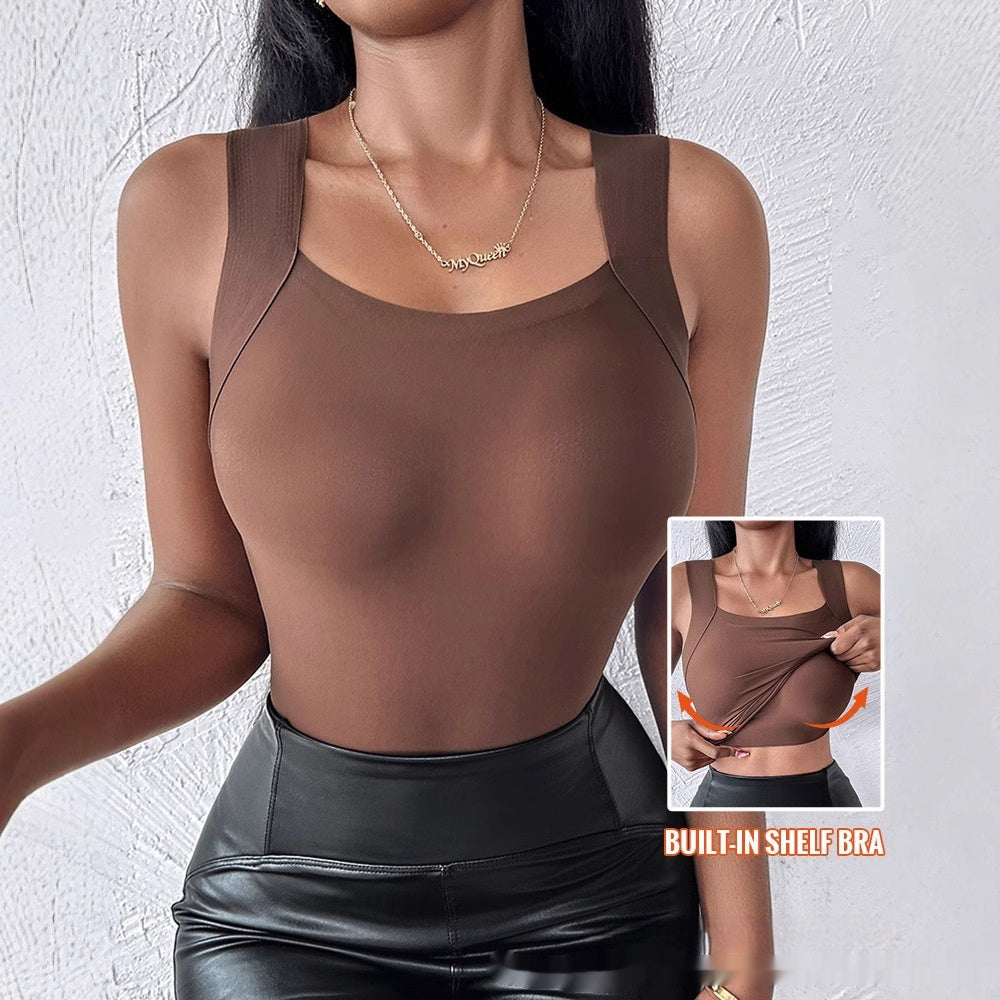 Woman wearing a brown tank top with built-in shelf bra feature on a white background.