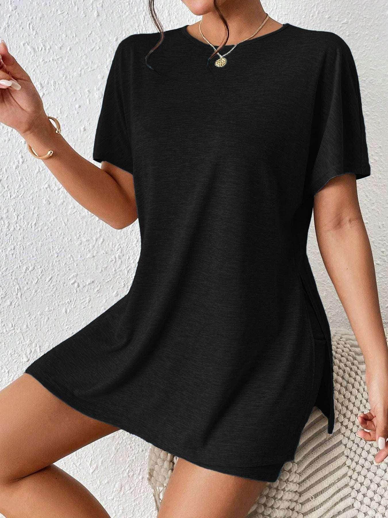 Woman wearing a trendy black t-shirt dress from ZA-Zola, chic casual fashion, UK style