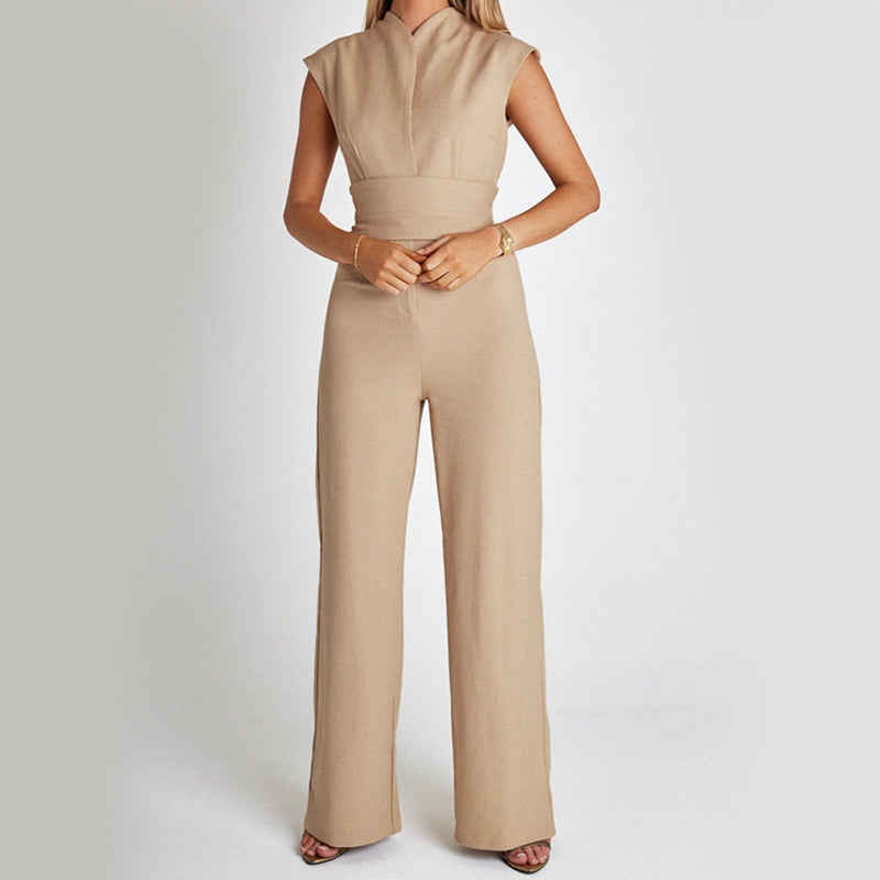 Beige jumpsuit worn by a person on a white background
