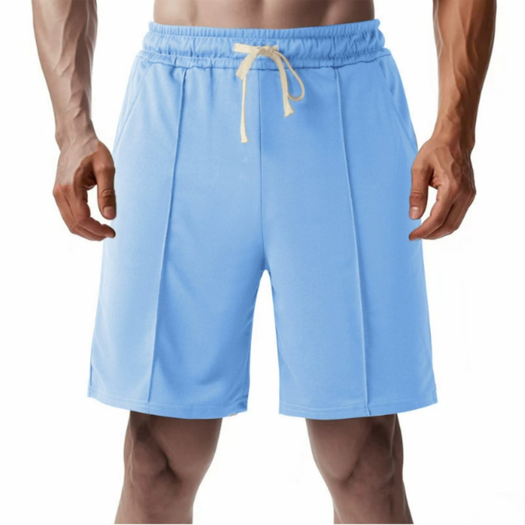 Light blue shorts with a yellow drawstring on a white background